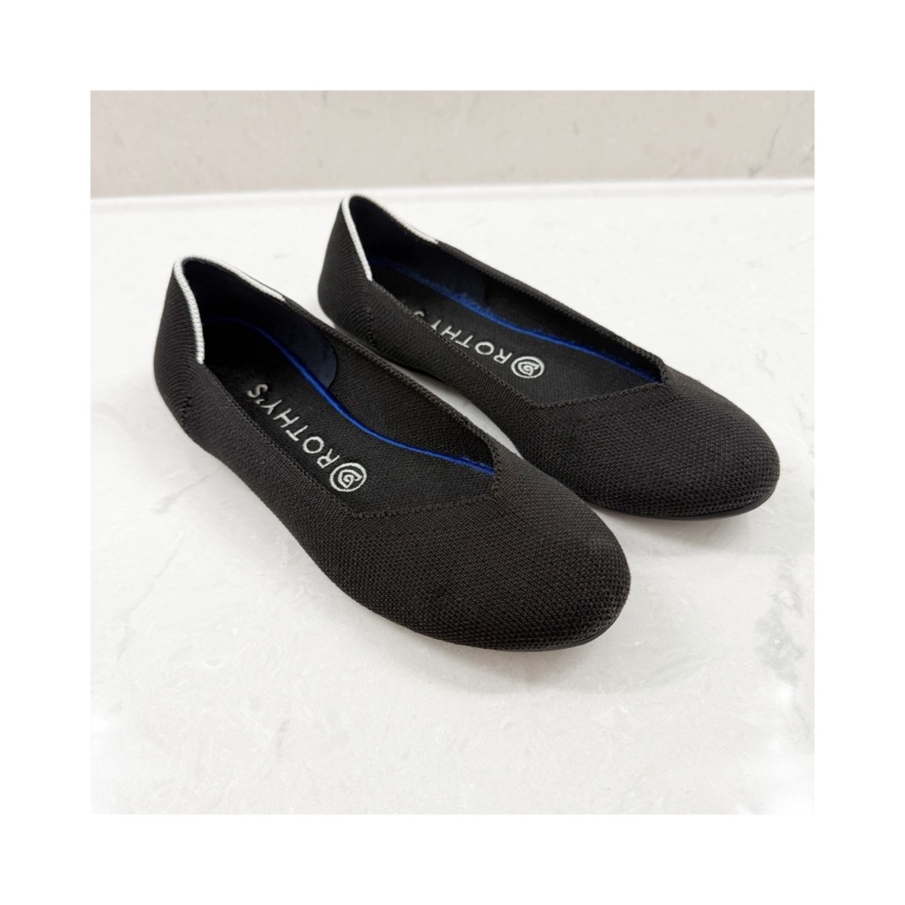 Rothy's Black Flats with White Trim